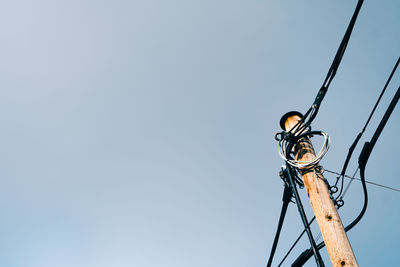 Low angle view of street light against clear sky