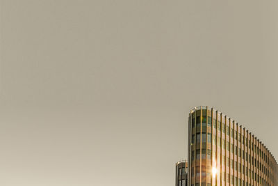 Low angle view of buildings against clear sky