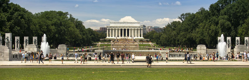 Group of people in front of historical building