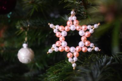 Close-up of christmas decoration hanging on tree