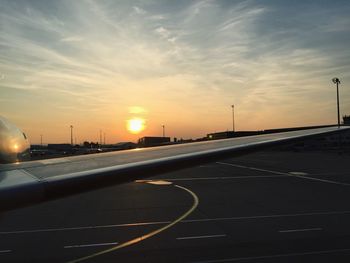 Road against sky during sunset