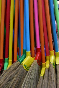 Close-up of multi colored mops for sale
