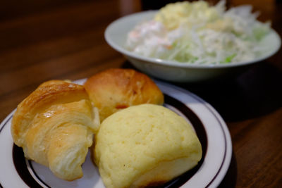 Close-up of bread in plate on table