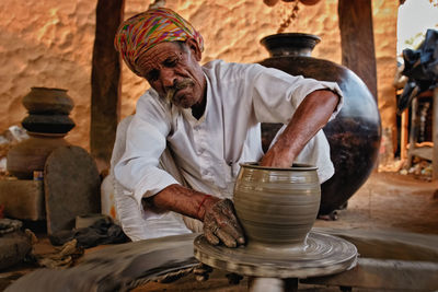 Man working in mud