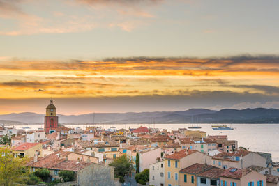 High angle view of townscape against sky during sunset