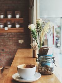 Flower vase on table