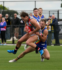 Full length of men playing in park