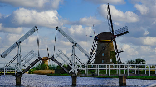 Traditional windmill against sky