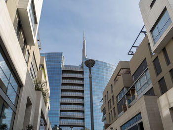 Low angle view of skyscrapers against sky