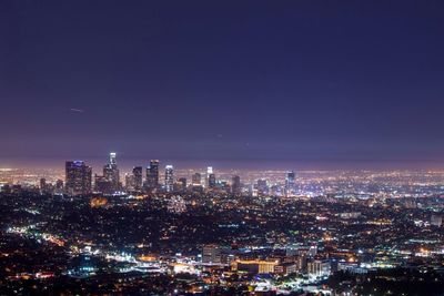 Illuminated cityscape at night