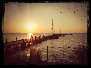 Scenic view of sea at sunset