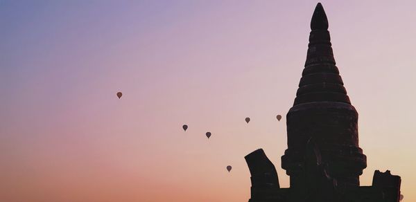 Hot air balloons over old bagan at sunset 