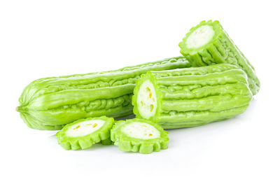 Close-up of green pepper against white background