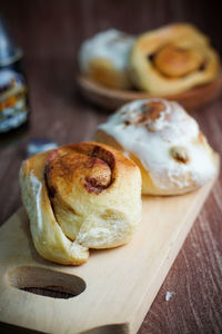High angle view of bread on cutting board