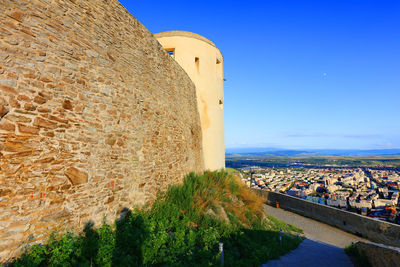 View of fort against clear blue sky