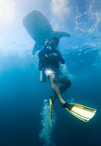 Man swimming in sea