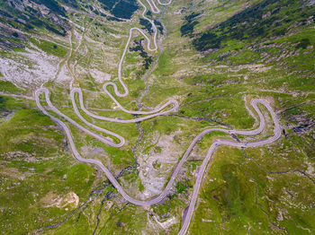 High angle view of winding road on landscape