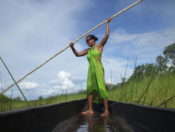 Woman on traditional boat