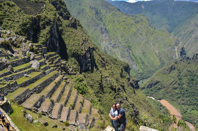 High angle view of people walking on mountain