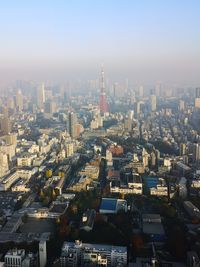 Aerial view of cityscape against clear sky