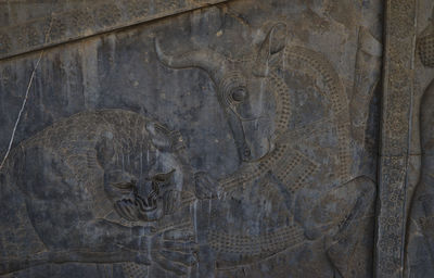 Close-up of crafting on wall  persepolis