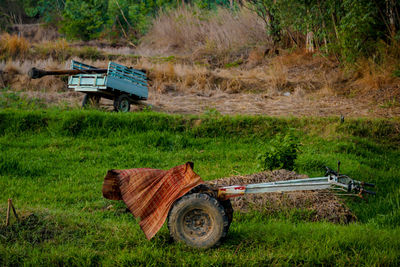 Side view of a vehicle on field