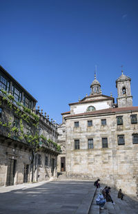 View of historic building against blue sky