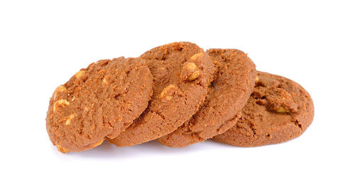 Close-up of cookies against white background