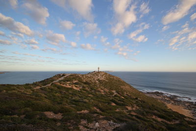 Scenic view of sea against sky at sunset