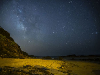 Scenic view of star field against sky at night