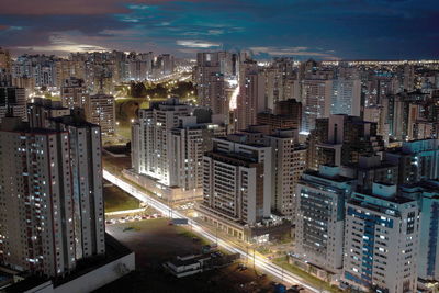 High angle view of illuminated cityscape at night