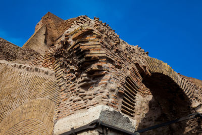 Detail of the walls of the famous colosseum in rome