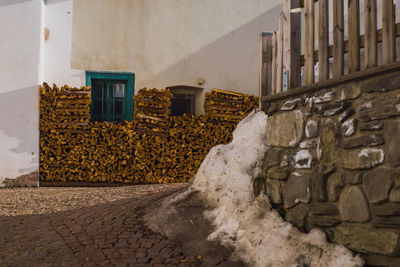 View of stone wall by street