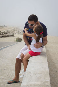 Father and son on beach