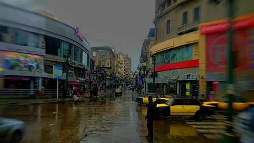 Wet city street at night