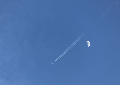 Low angle view of vapor trail in sky