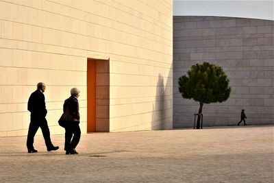 People walking in modern office building