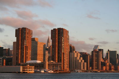 Modern buildings in city against sky