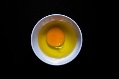 High angle view of breakfast in bowl against black background