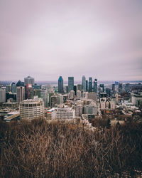 Buildings in city against sky