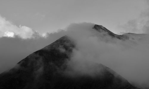 Scenic view of volcanic mountain against sky