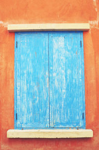 Close-up of blue door of building