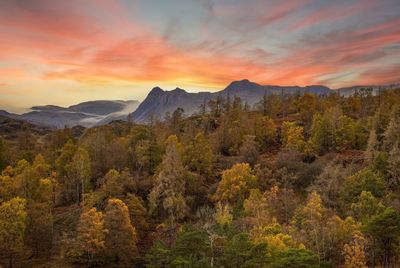 Scenic view of mountains against sky during sunset