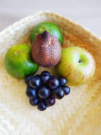 High angle view of grapes on table