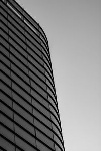 Low angle view of modern building against clear sky