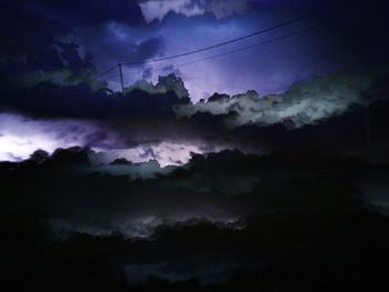 Low angle view of clouds in sky at night