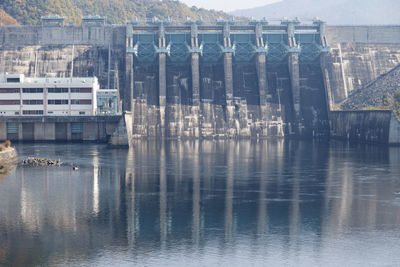 High angle view of dam on sea against sky