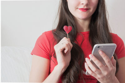 Young woman using mobile phone