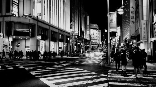 People on street in city