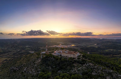 Spain, balearic islands, menorca, aerial view of sanctuary of verge del toro at sunset